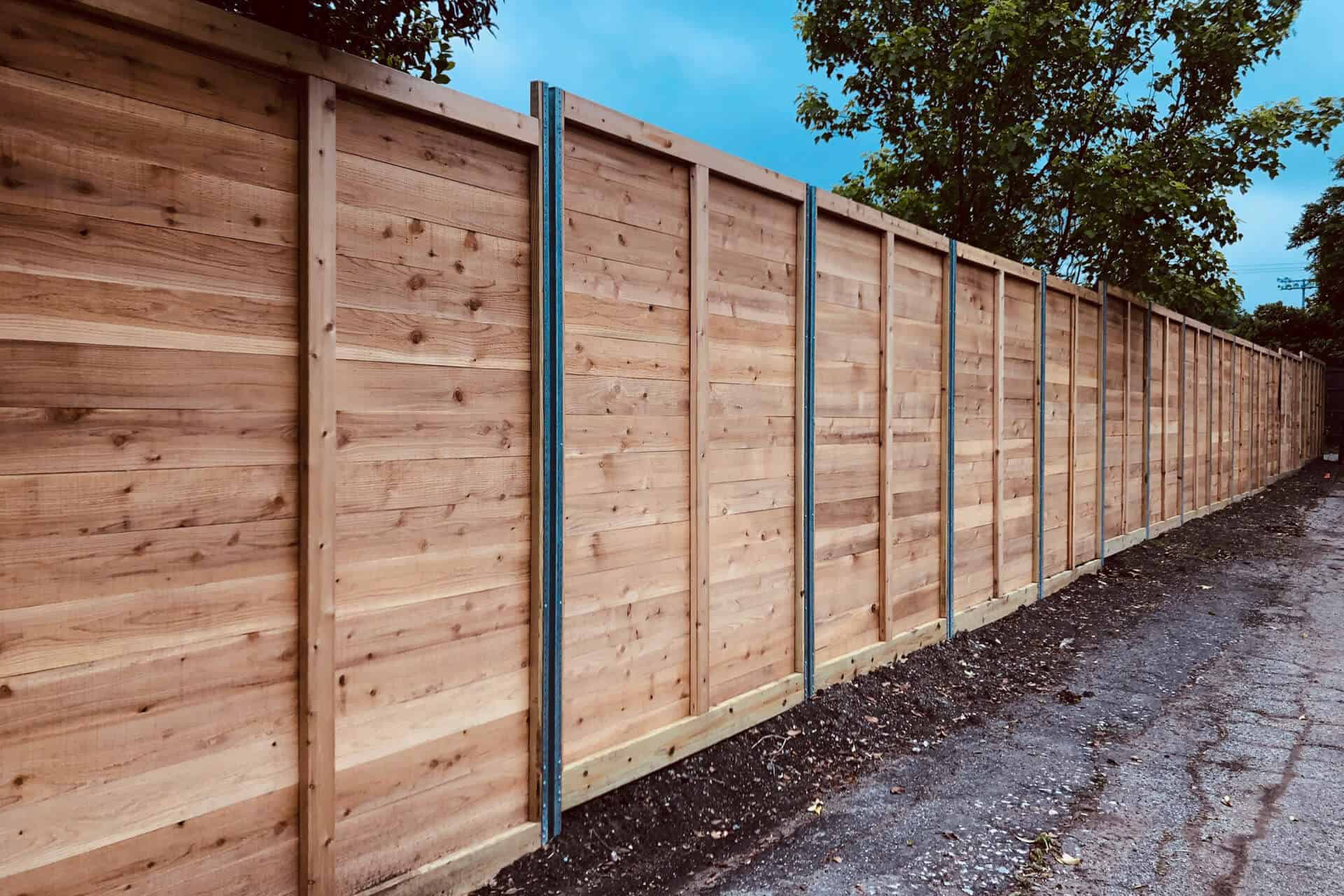 Specialty Fence Design By Mossy Oak Fence Company In Orlando And Melbourne Fl Wood Stained Posts Aluminum F Fence Design Building A Fence Fence Around Pool