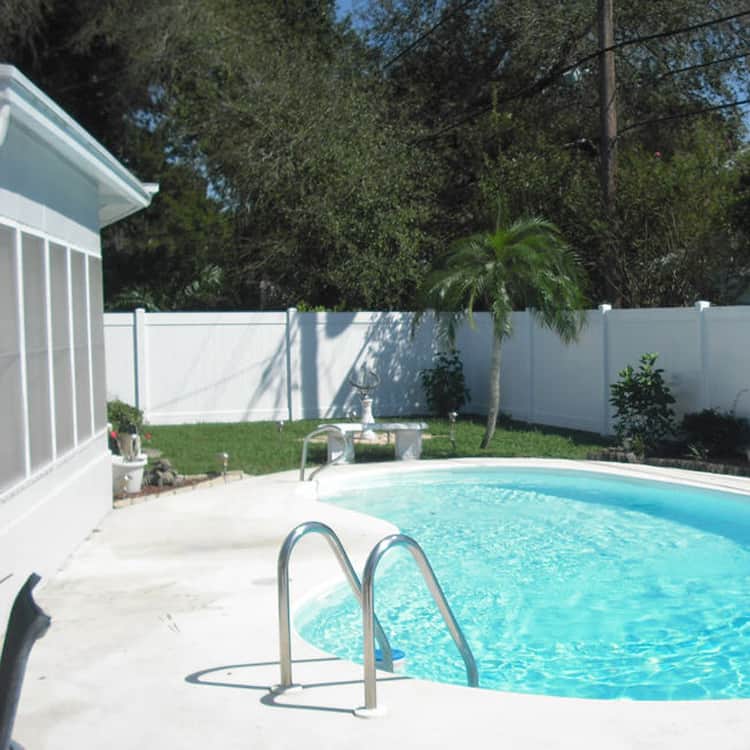 Privacy Fence around Naples Backyard swimming pool
