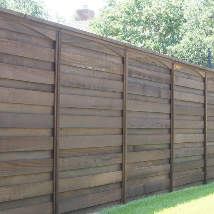 Keller Fence Company dark stained wood fence