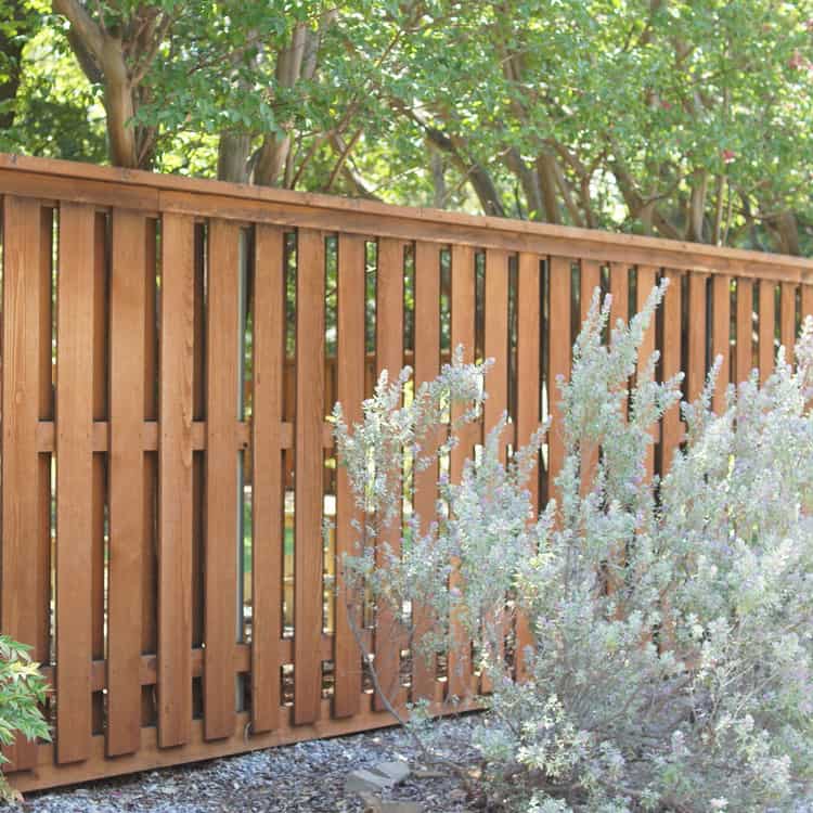 Benbrook fence builder dark stained wood privacy fence