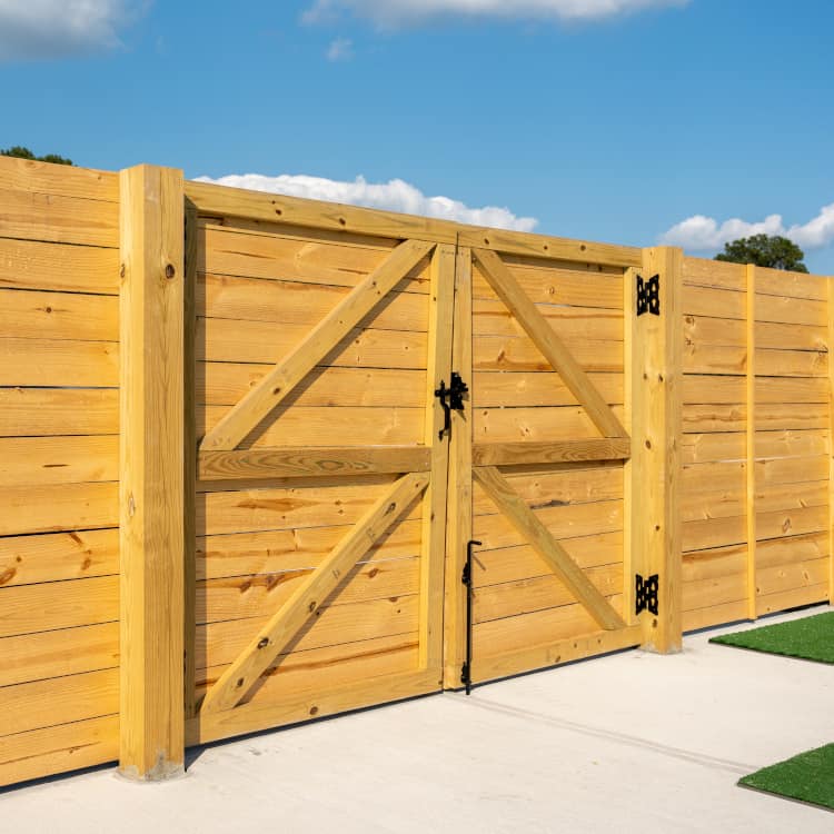 fort collins fence company wood fence with a gate