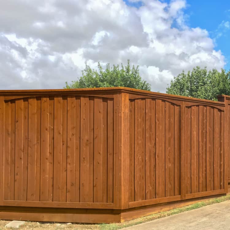 Humble fence builder dark stained wood fence